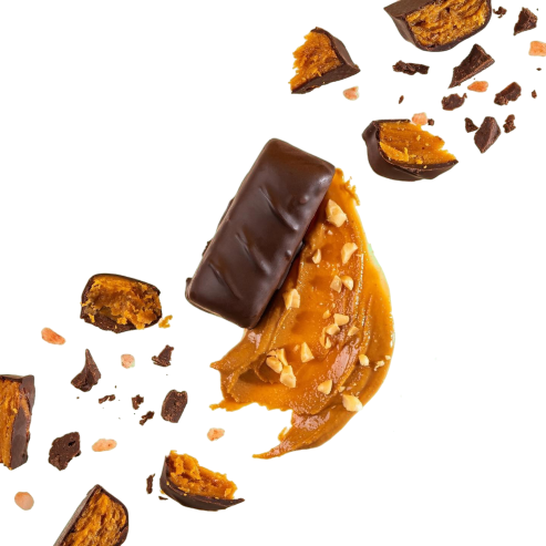 Peanut butter crunch bar from Krack'd Snacks, with peanut butter swirl, nuts, and chocolate pieces.