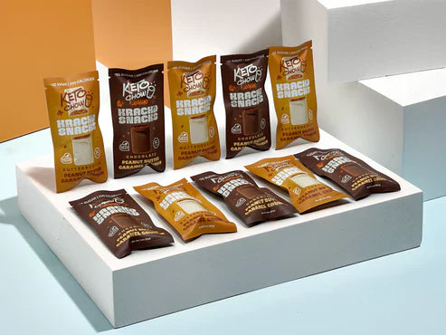 A display of Krack’d Snack bars and Keto Chow Peanut Butter Caramel Crunch bundles.