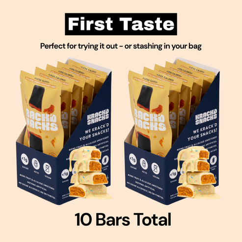 A box of Krack’d Snacks with keto-friendly, monk fruit-sweetened bars featuring dark chocolate and a crunchy Aloha caramel filling.